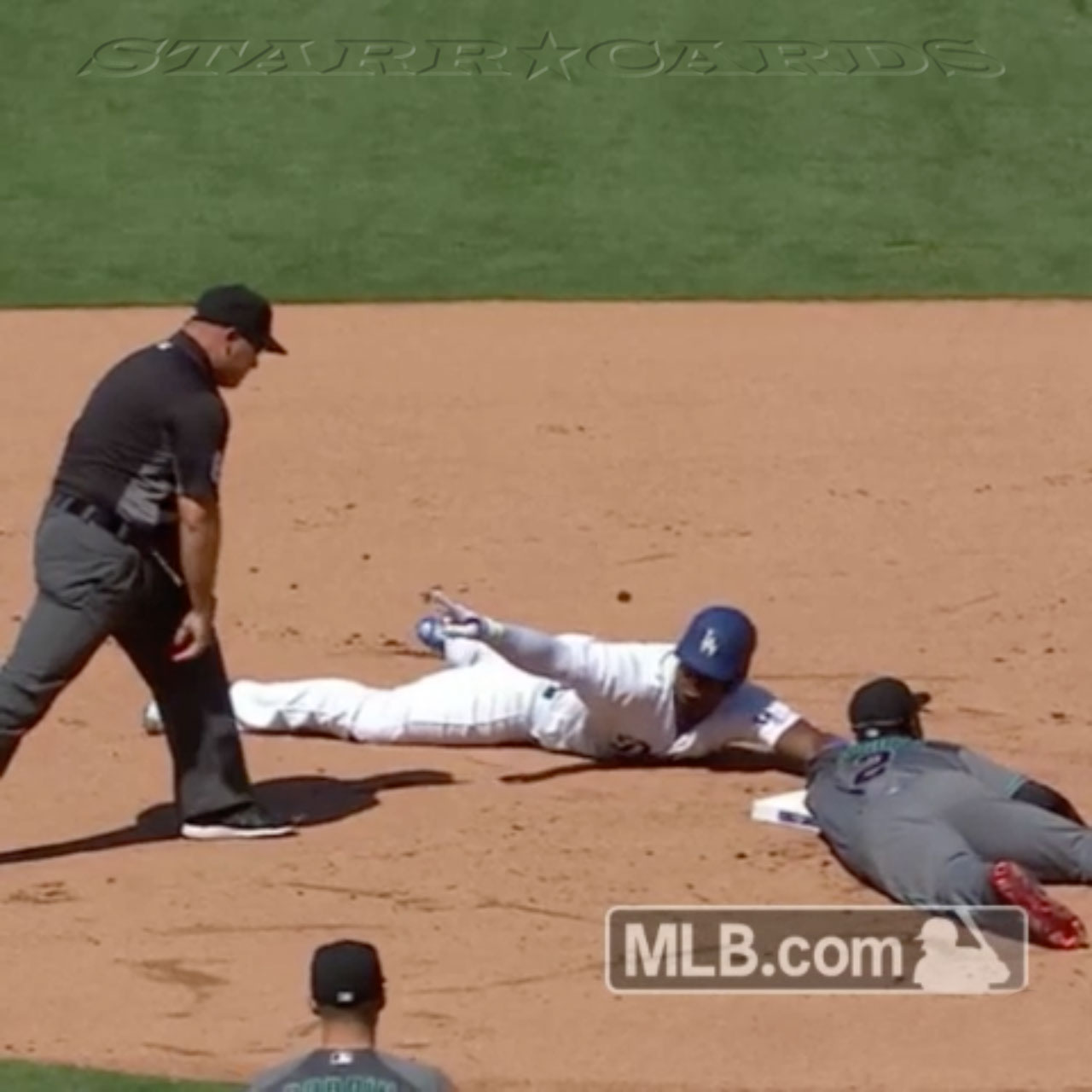 Dodgers' Yasiel Puig is safe at second after avoiding tag