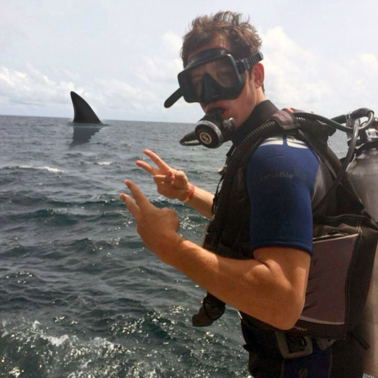 Evgeni Malkin prepares to dive with a shark.