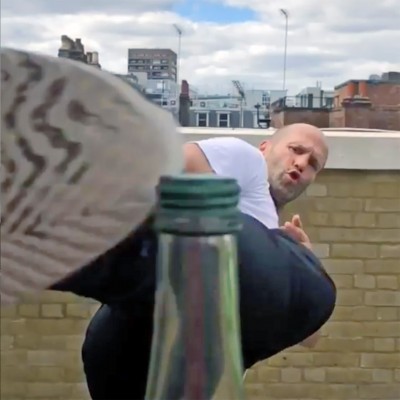 Jason Statham takes the Bottle Cap Challenge