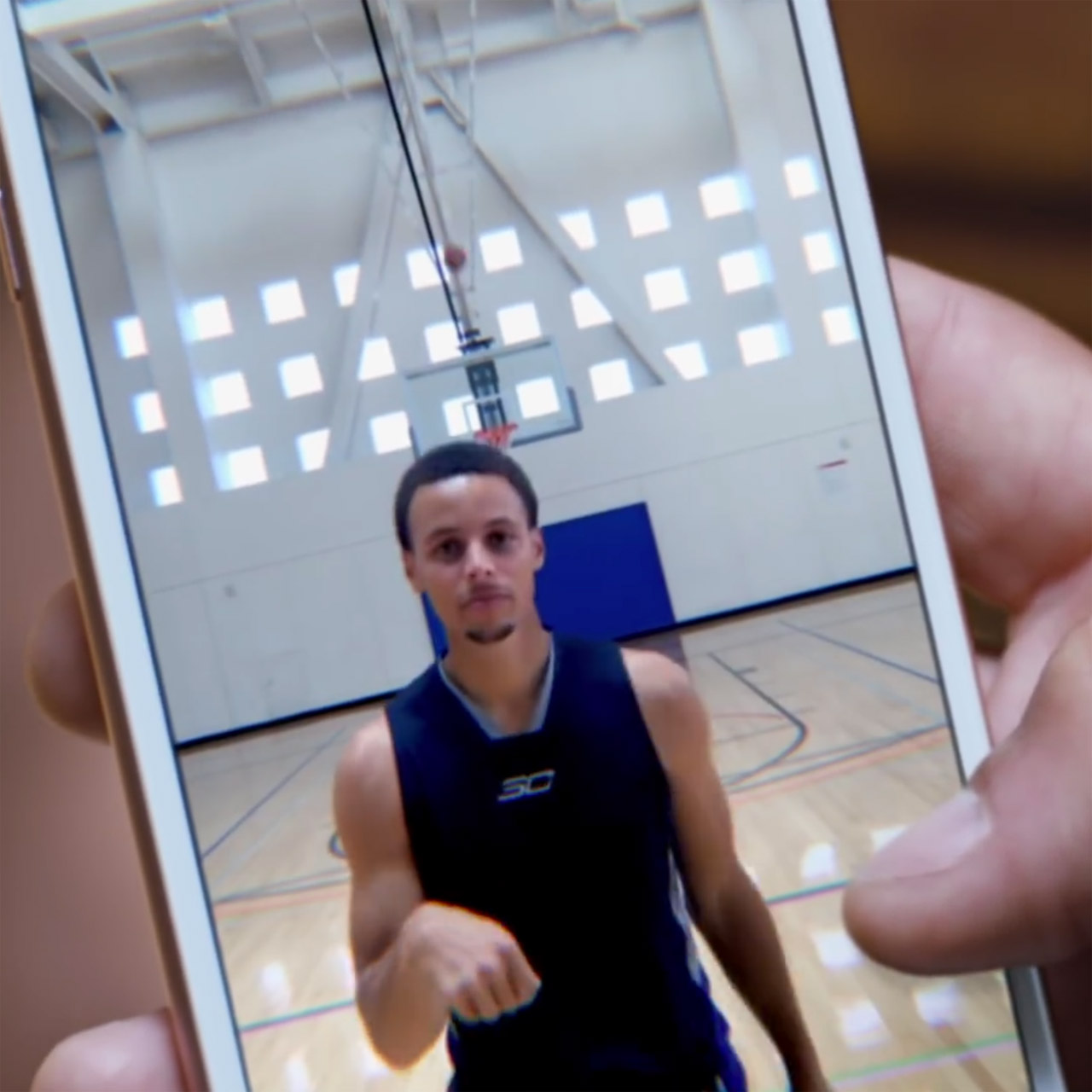Steph Curry make half court shot in ad for Apple iPhone 6s with Live Photos
