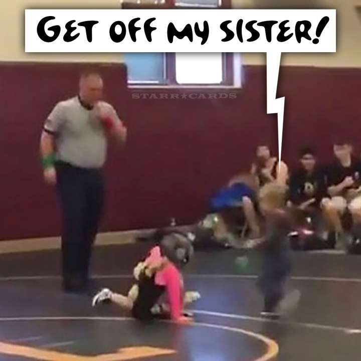 Toddler runs on mat to rescue sister during wrestling match